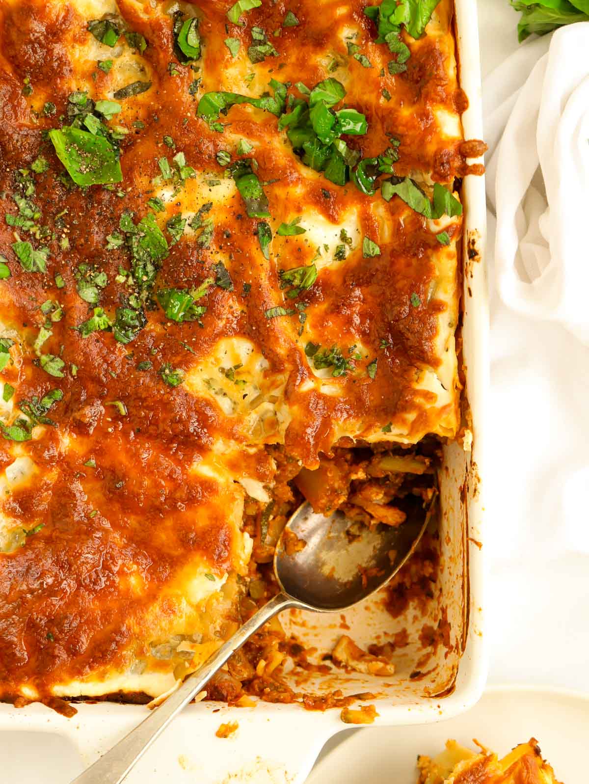 Easy to make courgette lasagne recipe in a white dish.