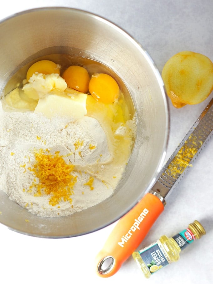 Egg, flour, butter and cake batter ingredients in a kitchen aid mixer bowl, ready to make Lemon Cupcakes.