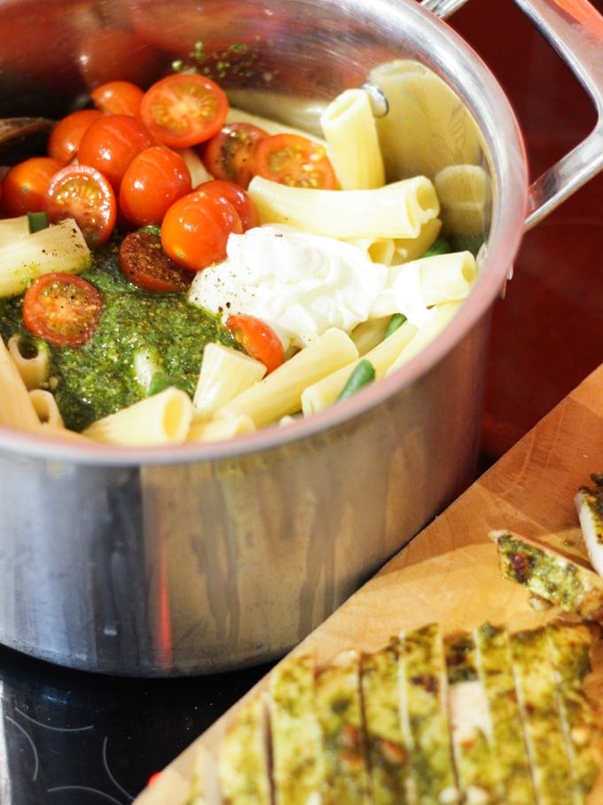tomatoes and creme fraiche in a saucepan to make sauce