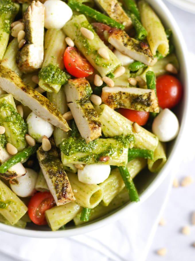 Chicken pesto pasta salad with veggies and cheese