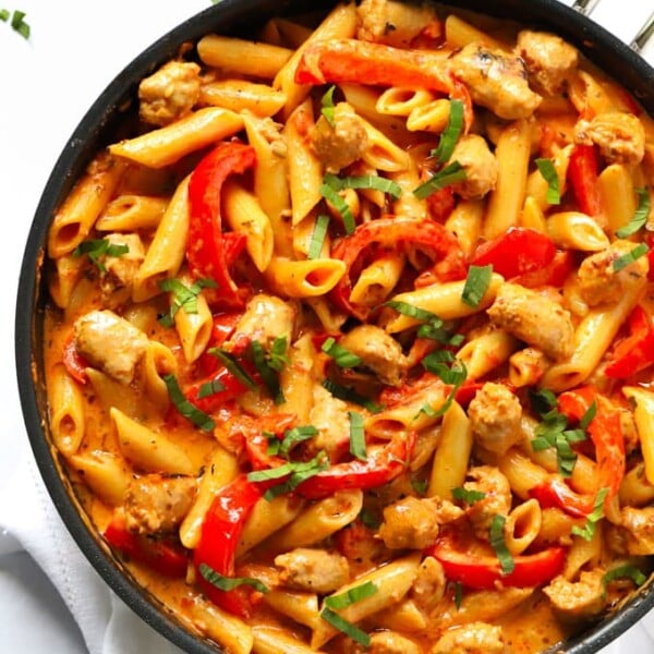 Easy spicy sausage pasta bake recipe in a frying pan