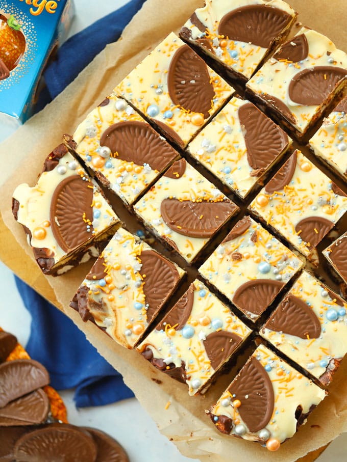 Chocolate Orange Rocky Road cut into squares, with white chocolate topping.