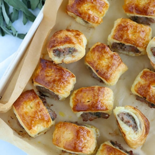 Easy sausage rolls on a baking sheet.
