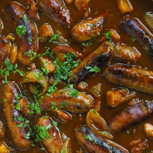 Sausage casserole recipe slow cooked with cider and bacon