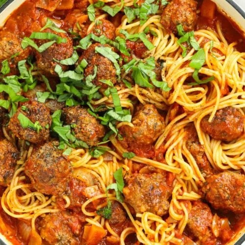Easy meatballs mixed with a rich sauce and spaghetti for a hearty family dinner.