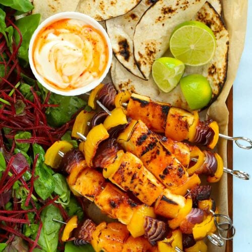 Sticky halloumi kebabs served with wraps, salad and chilli mayo dipping sauce