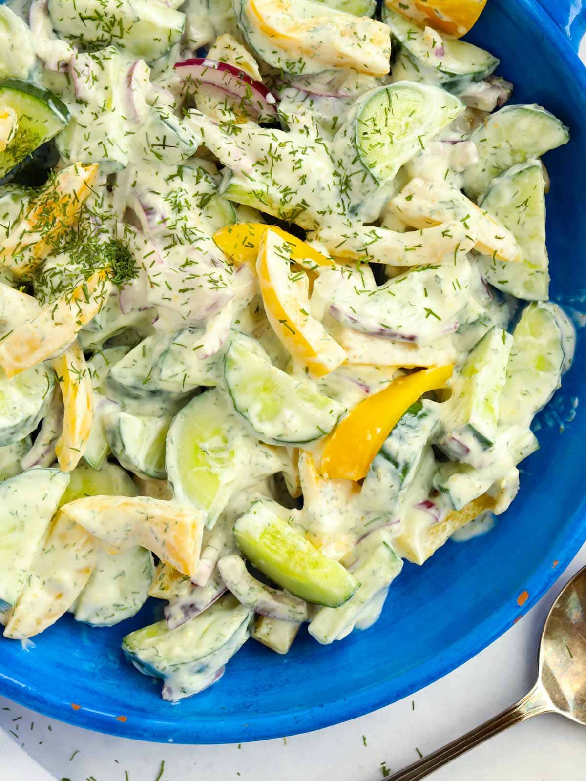 Salad recipe with cucumber and peppers and yoghurt dressing.