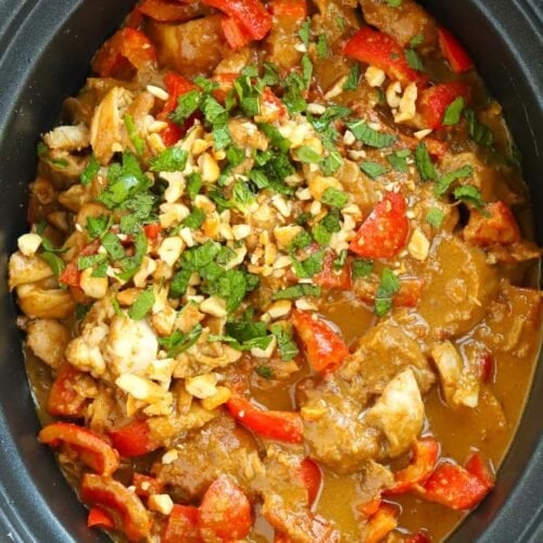 Slow Cooker Chicken Satay after it has been cooked with peppers and peanut butter.