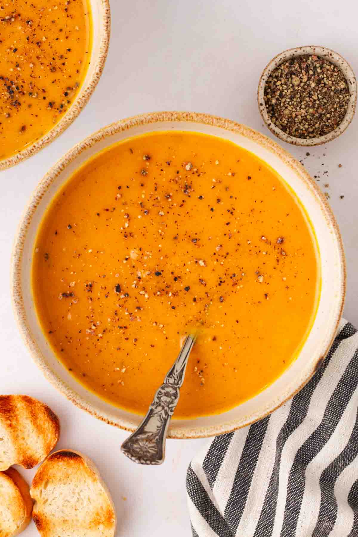 Easy Homemade Butternut Squash Soup in a bowl with spoon
