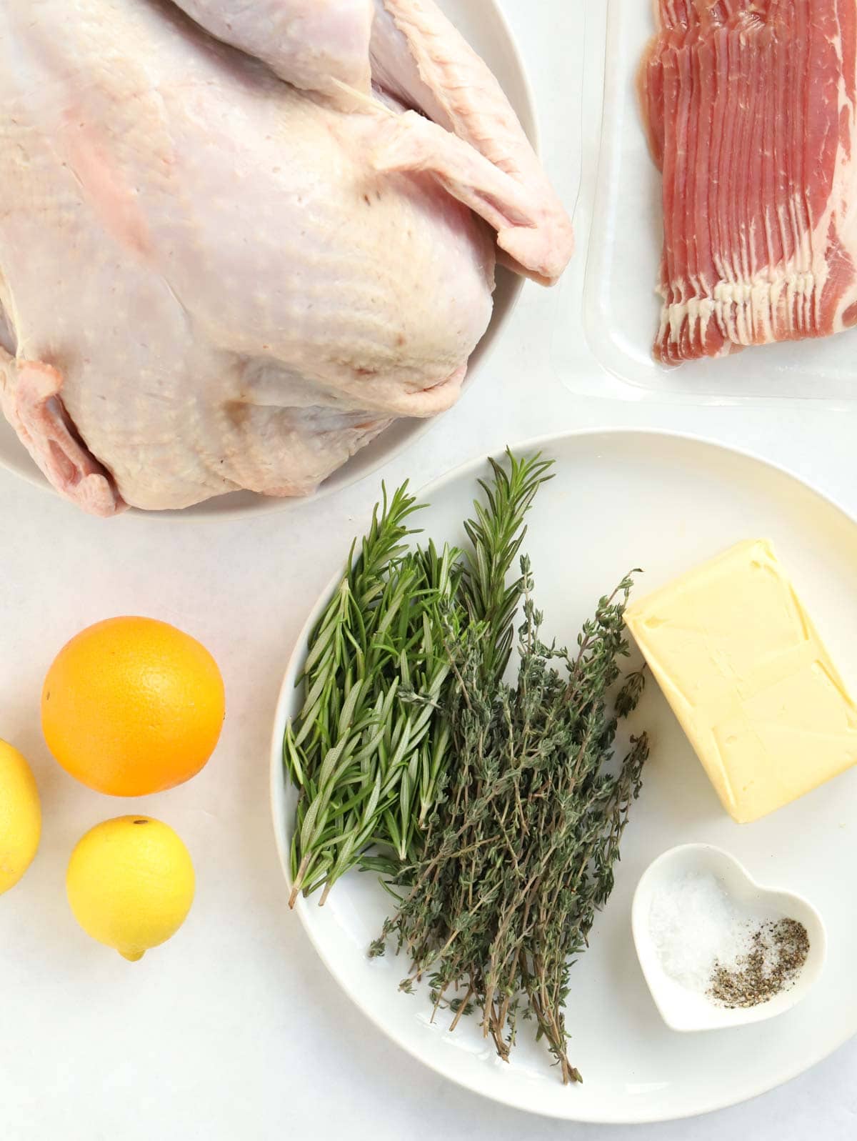 Ingredients for making a Christmas Turkey laid on a counter.