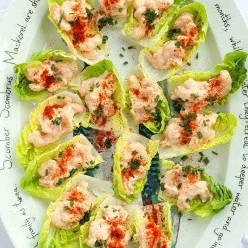 How to make prawn cocktail canapés. Finished nibbles on a platter.