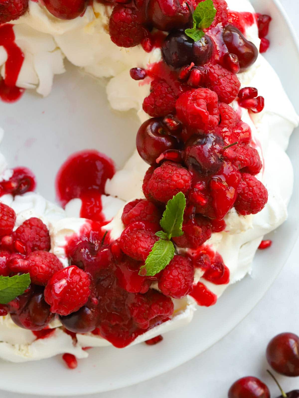 Close up of a just-made Christmas Wreath Pavlova