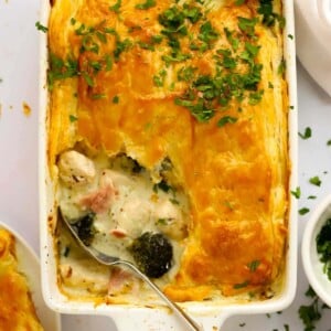 Chicken and Ham Pie with golden crust being served straight out of the oven.