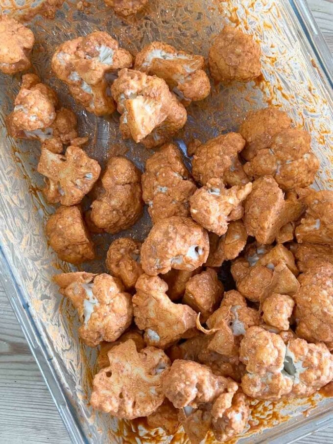 Pieces of cauliflower coated in spices.