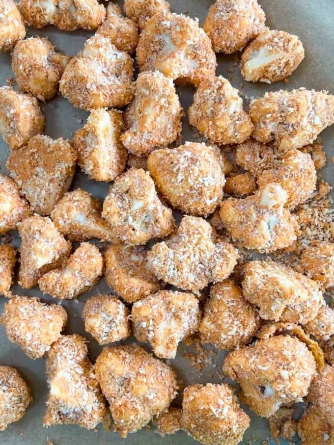 Cauliflower pieces coated in breadcrumbs.