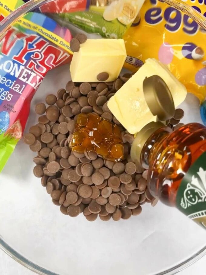 Ingredients in a bowl: Milk chocolate, butter and gold syrup.