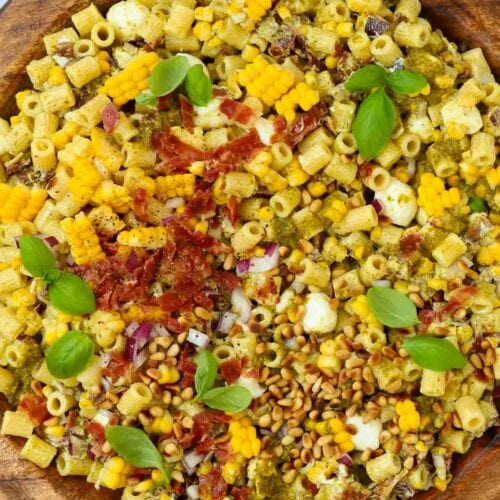 A big bowl of pasta salad that takes 15 minutes to make.