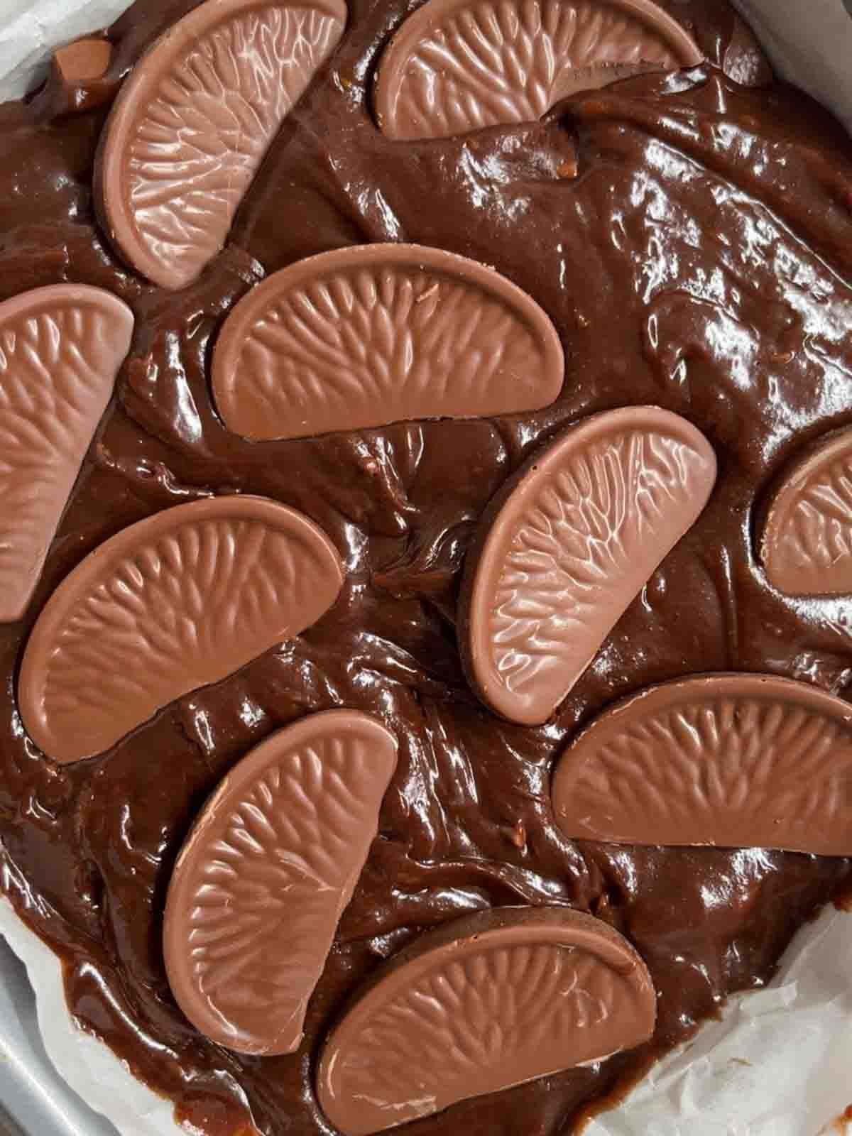 A close up of an unbaked Chocolate Orange Brownie for step 4 in the recipe.