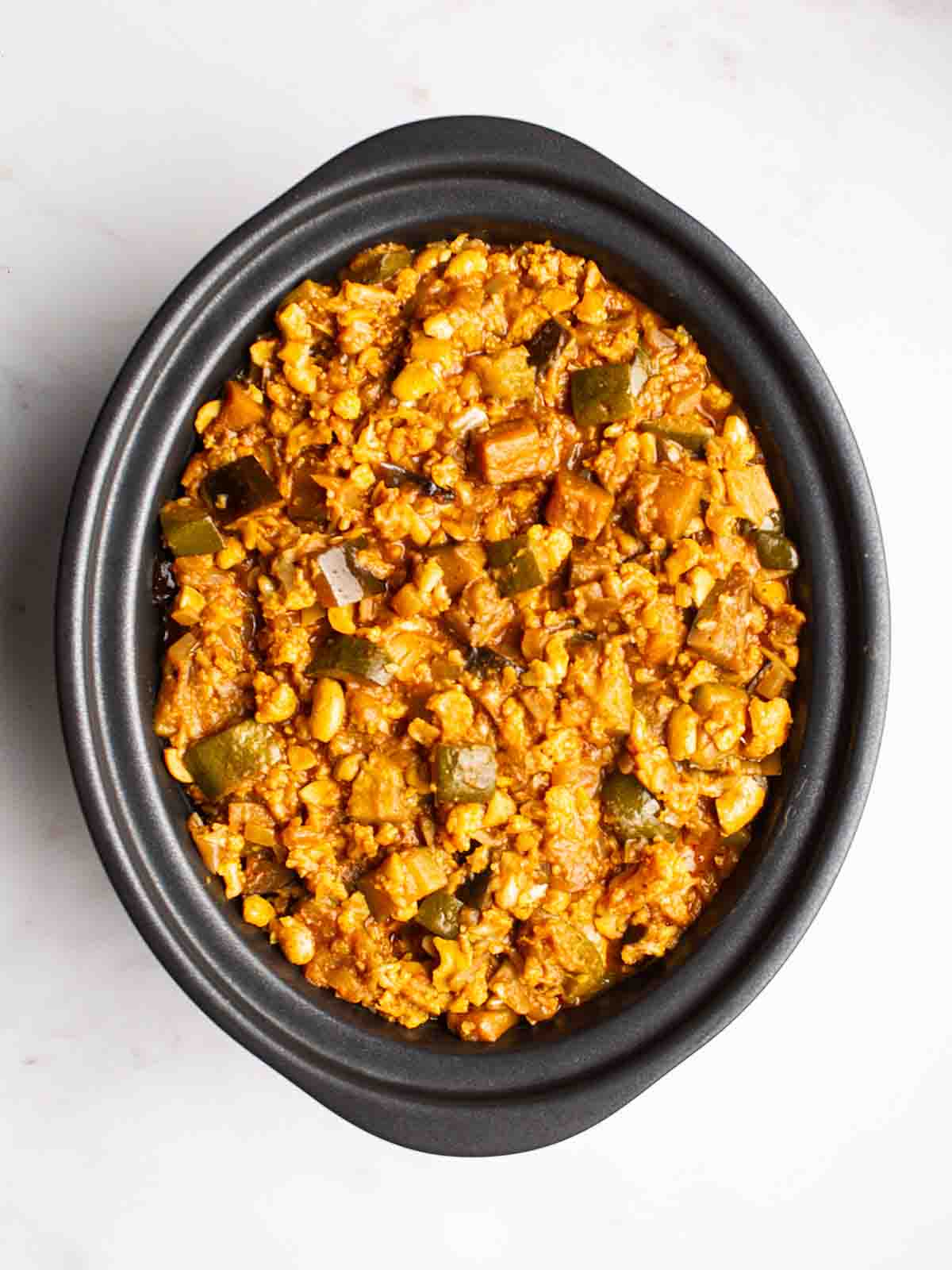 Slow cooker vegetarian curry ready to garnish.