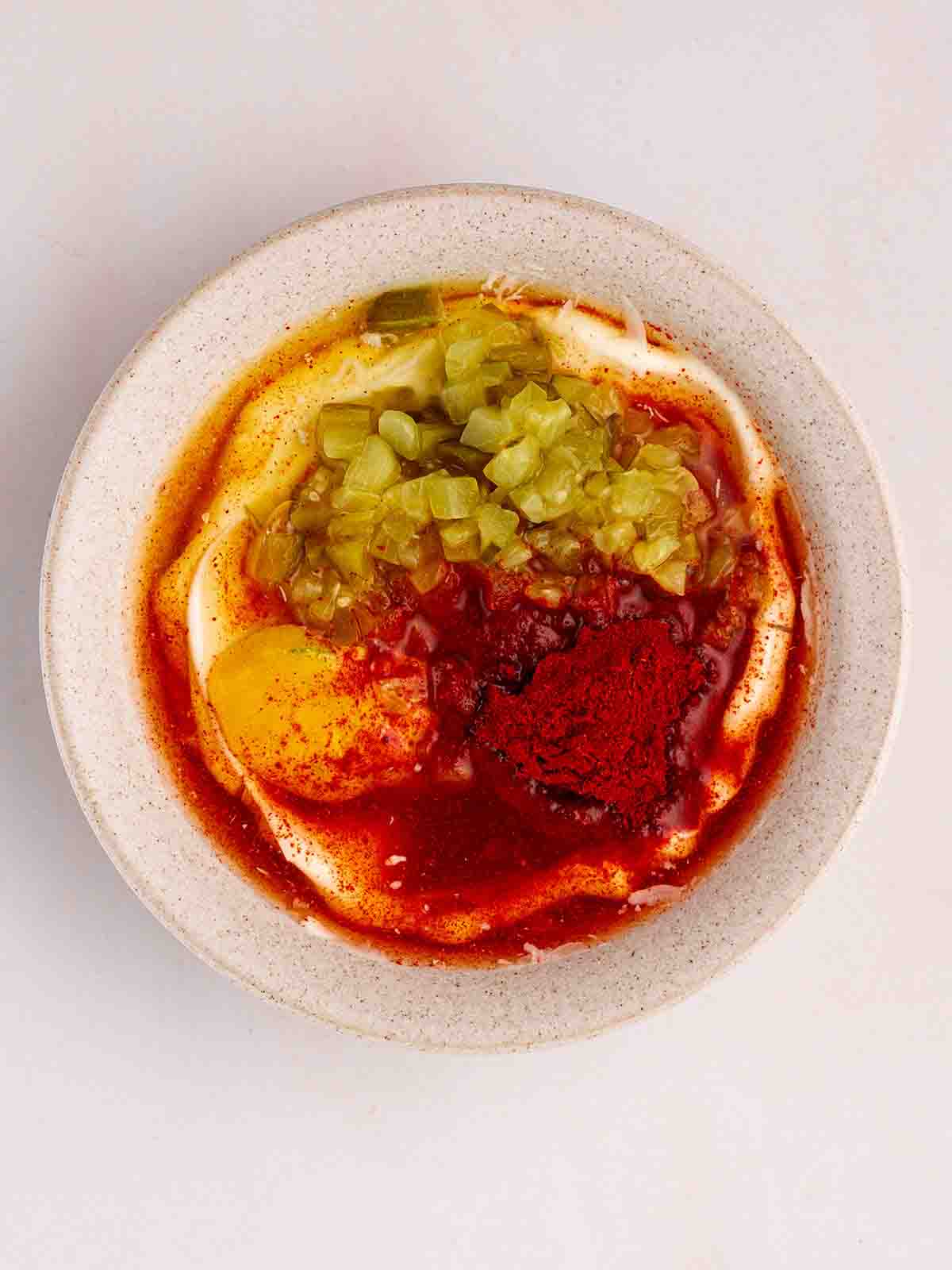 A combination of Big Mac Sauce ingredients in a bowl, not yet mixed together.