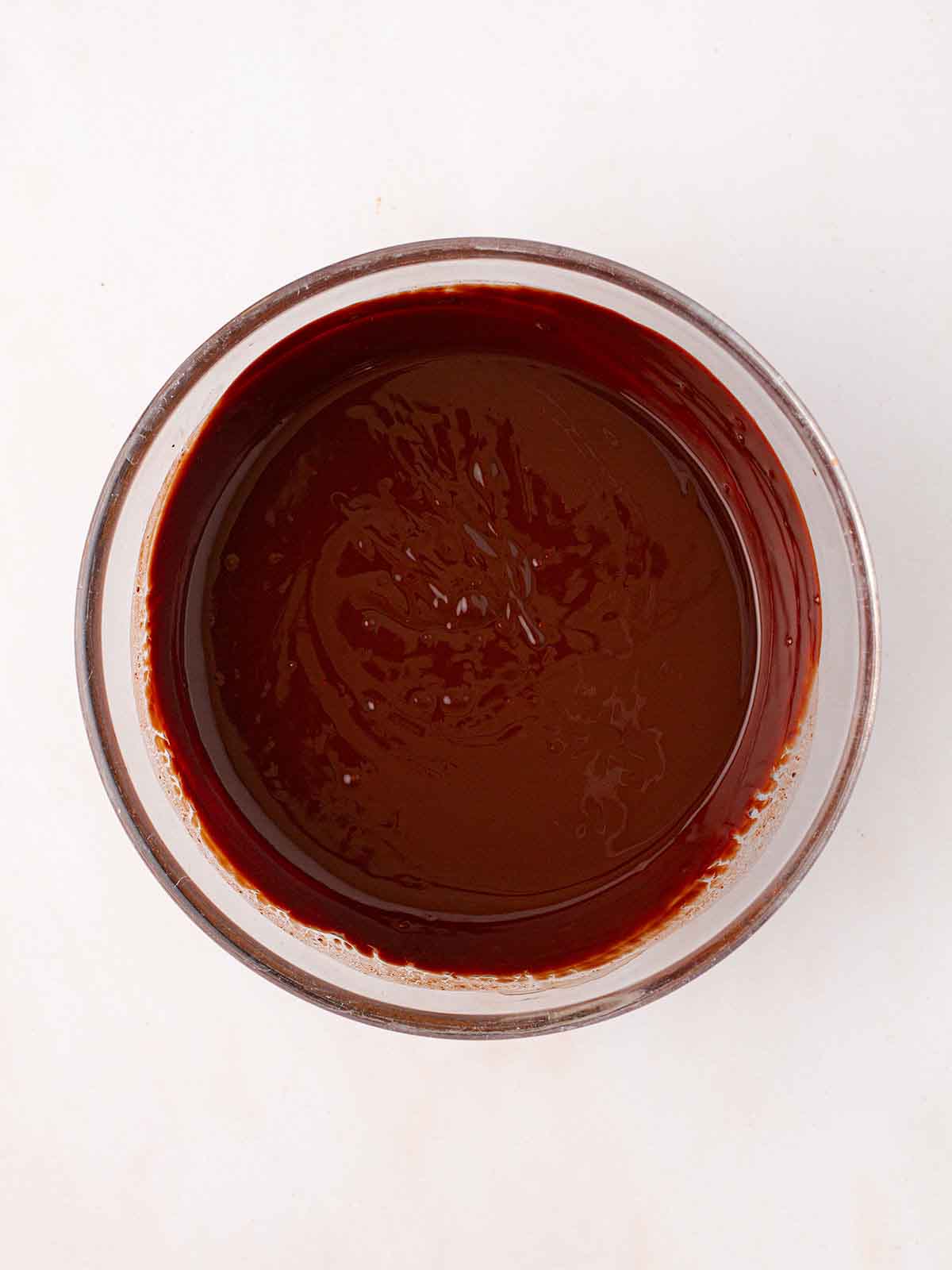 Melted chocolate in a bowl for step 2 in the recipe for Rocky Road.