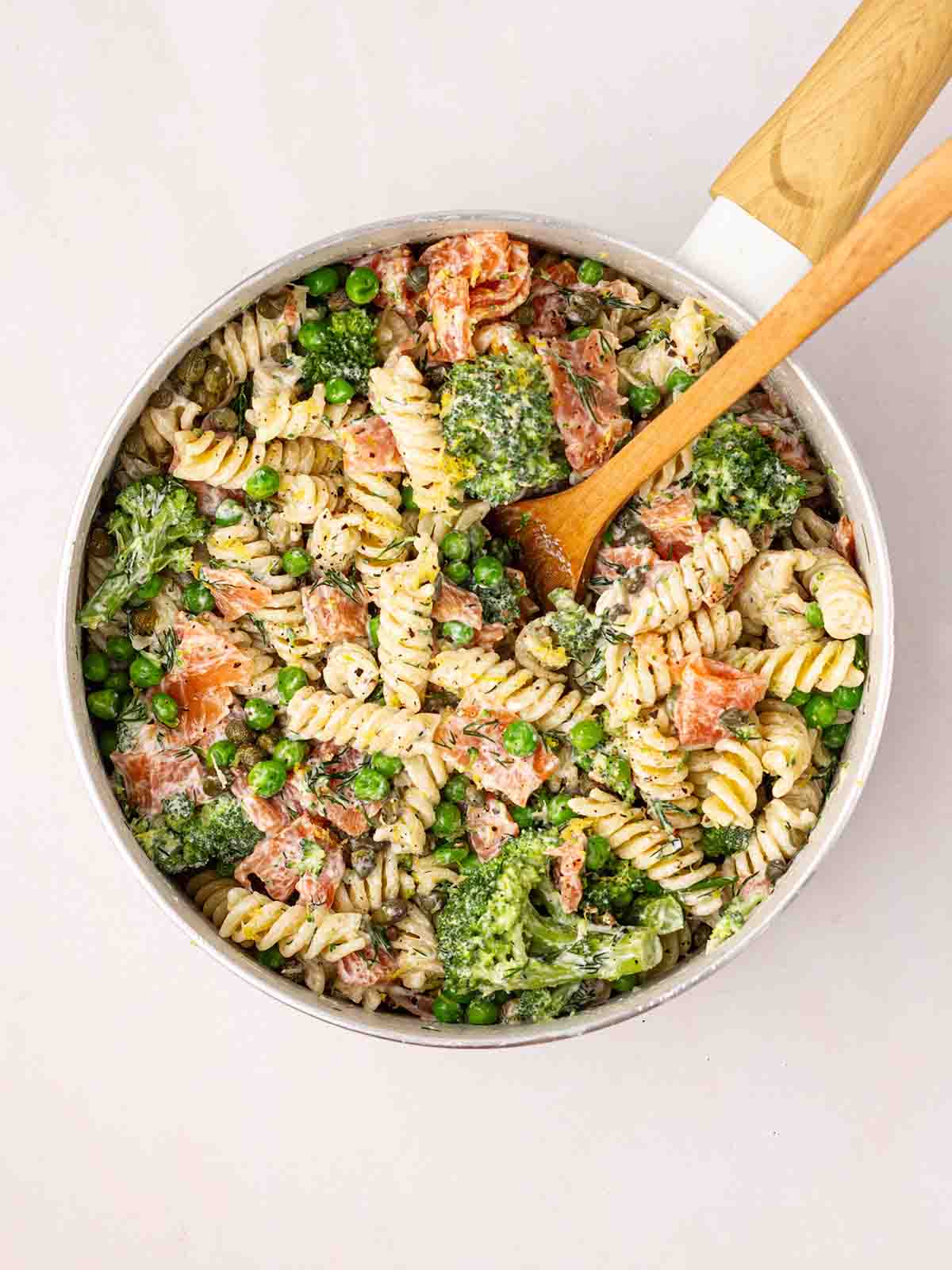 Smoked Salmon Pasta ingredients mixed together in a pan.