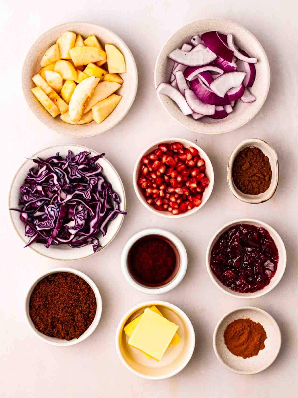 Ingredients for Braised Red Cabbage laid out on a counter.