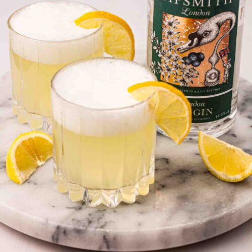 Gin Fizz Cocktails on a board, ready to be served.