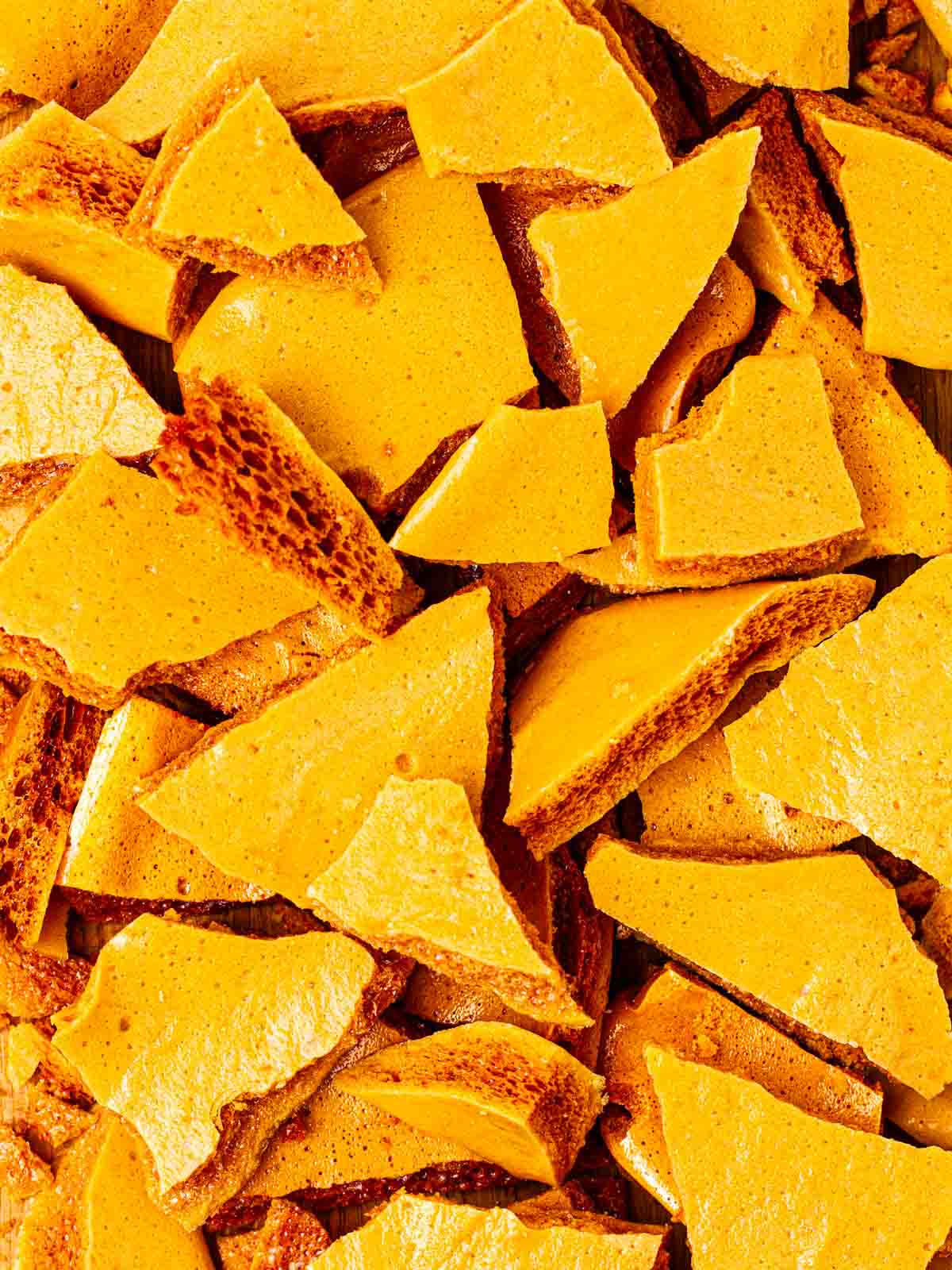 Lots of pieces of golden homemade honeycomb.