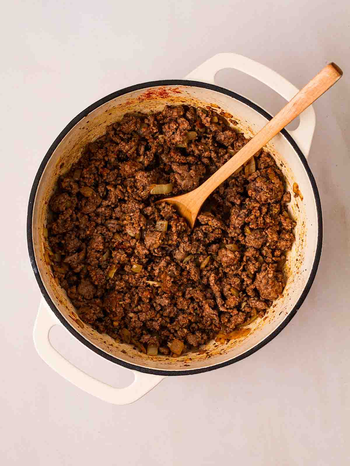 A pan filled with mince beef for step 1 in the recipe for Beef Enchiladas.