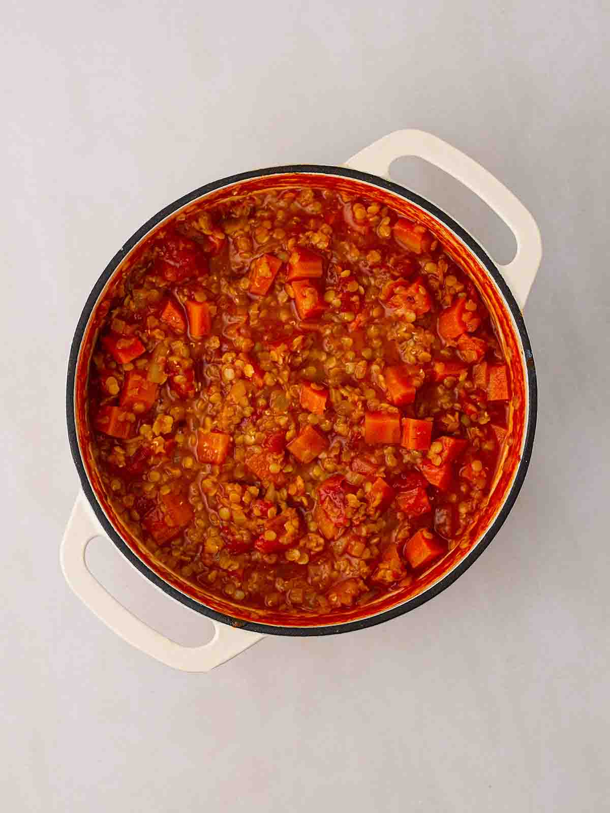 Carrots and Lentils thickened in a tomato liquid for step 3 in the recipe for Carrot and Lentil Soup.
