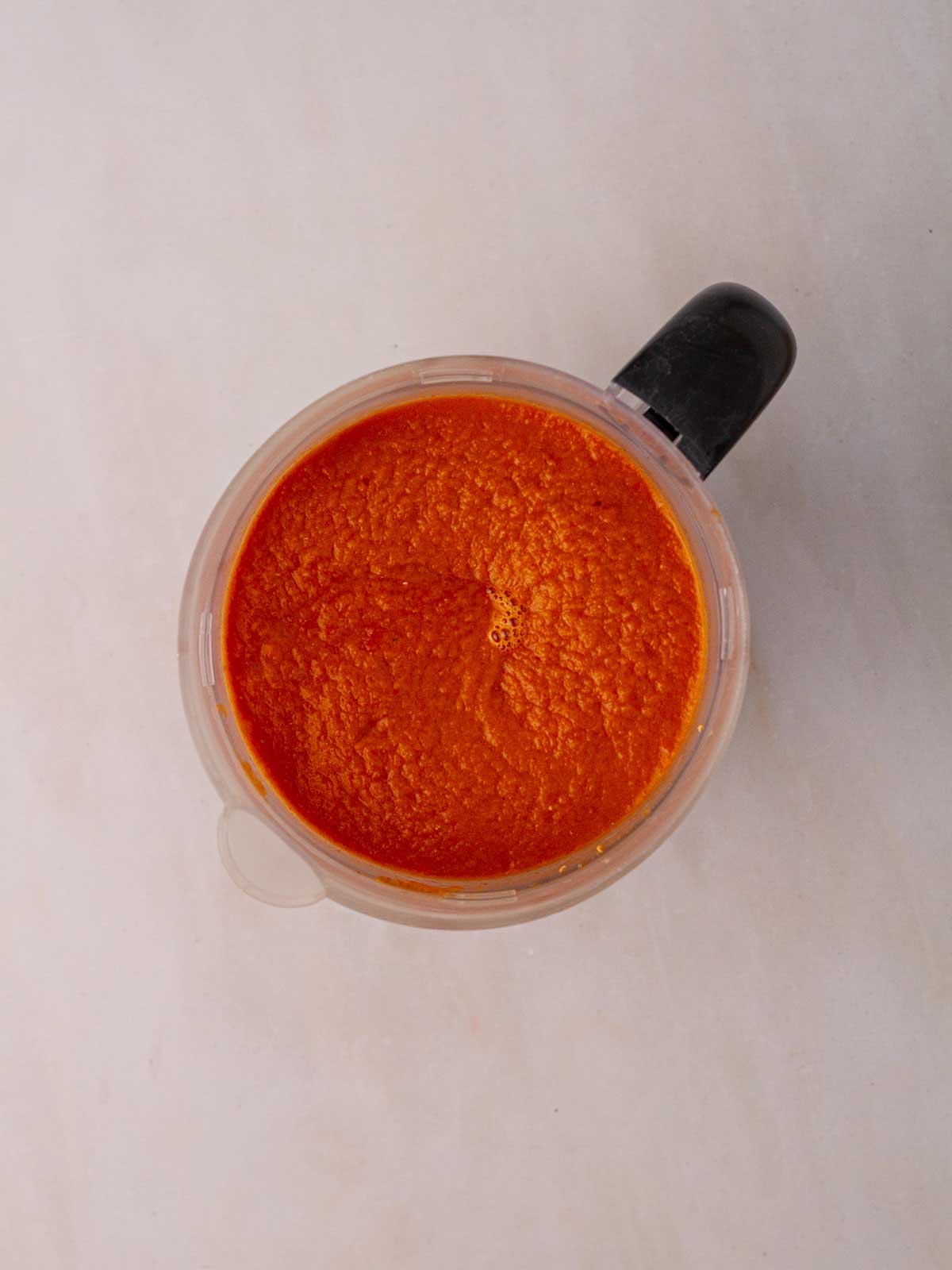 Carrot and Lentil Soup in a blender for the final step in the recipe.