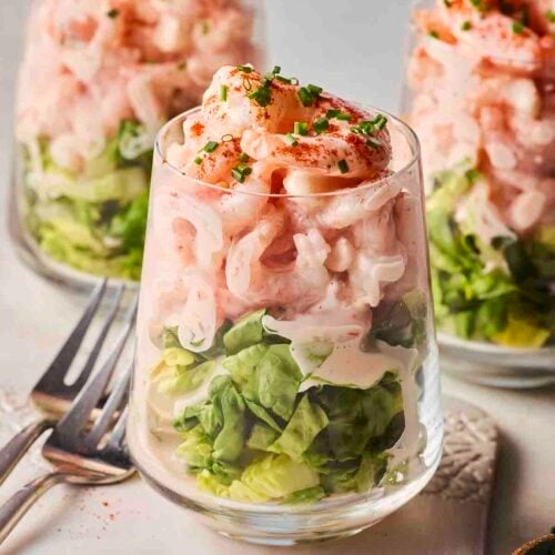 Three glasses of prawn cocktail, ready to eat.