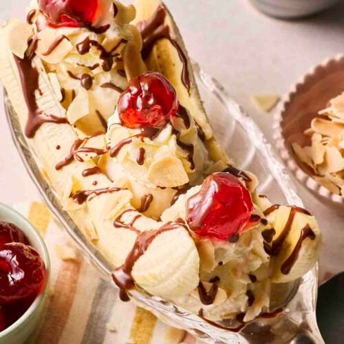 A classic banana split with cream, ice cream and toppings.