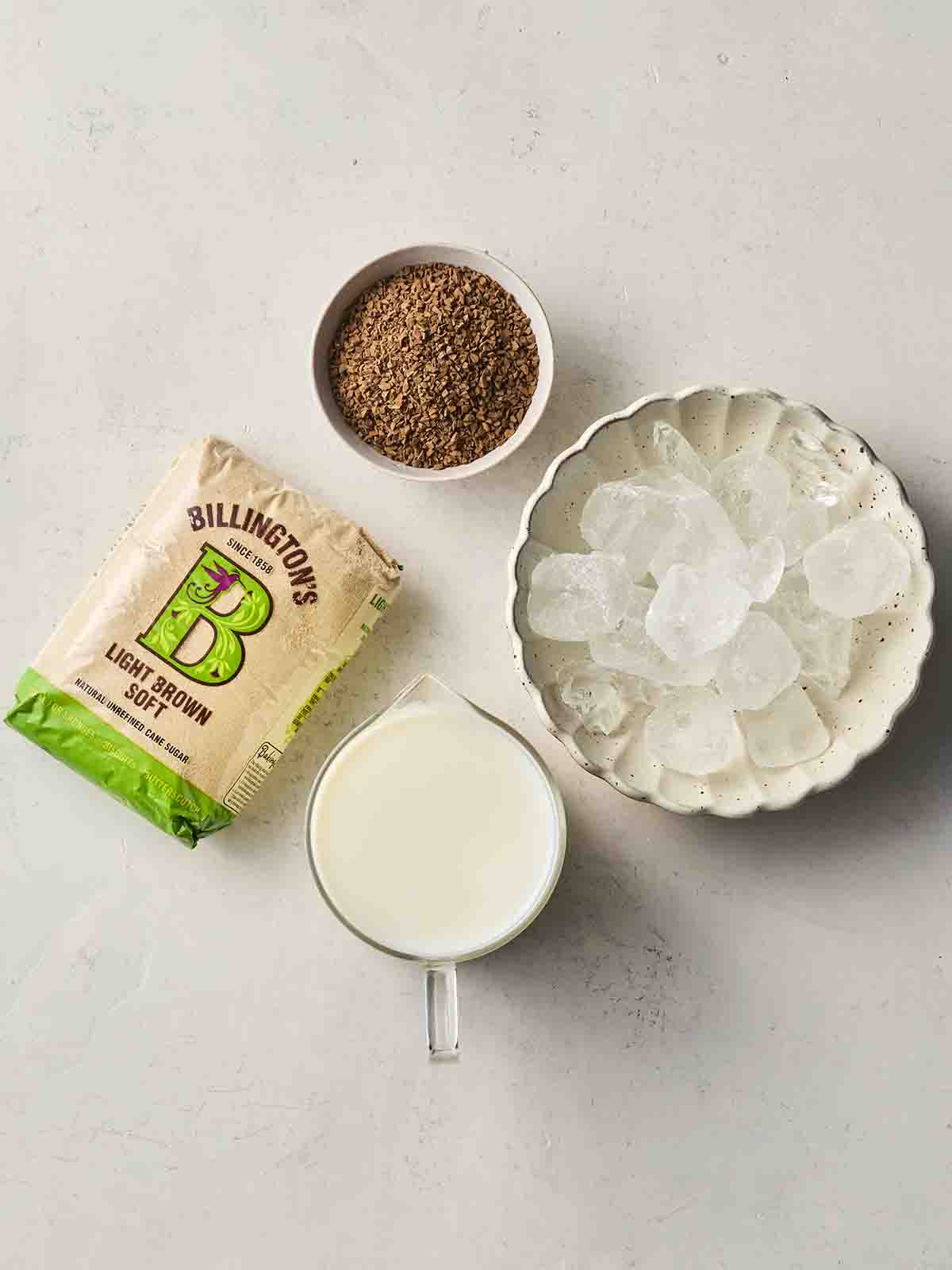 Ingredients for making Iced Coffee on a counter top.
