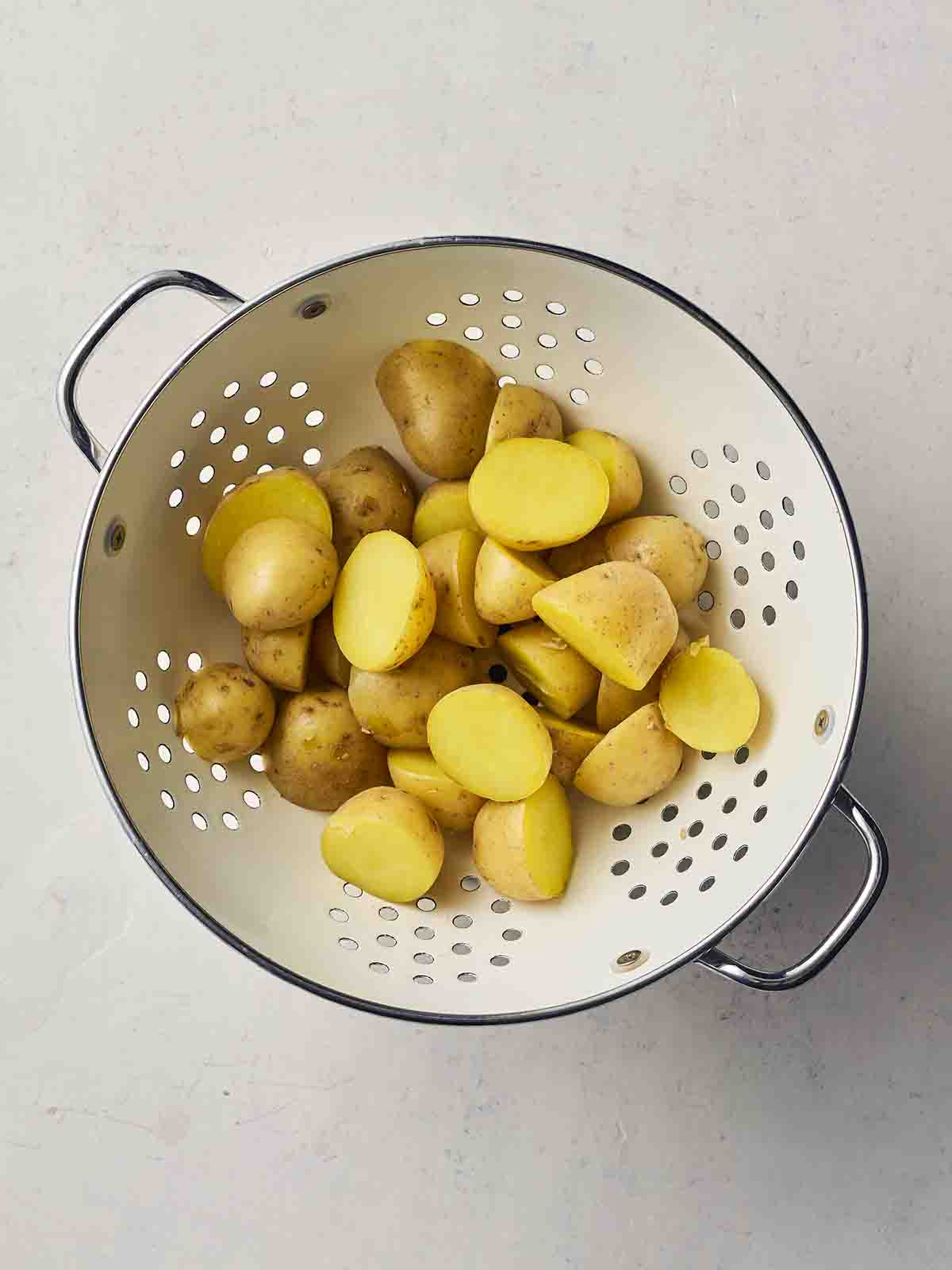 Salad potatoes in a colander, drained.