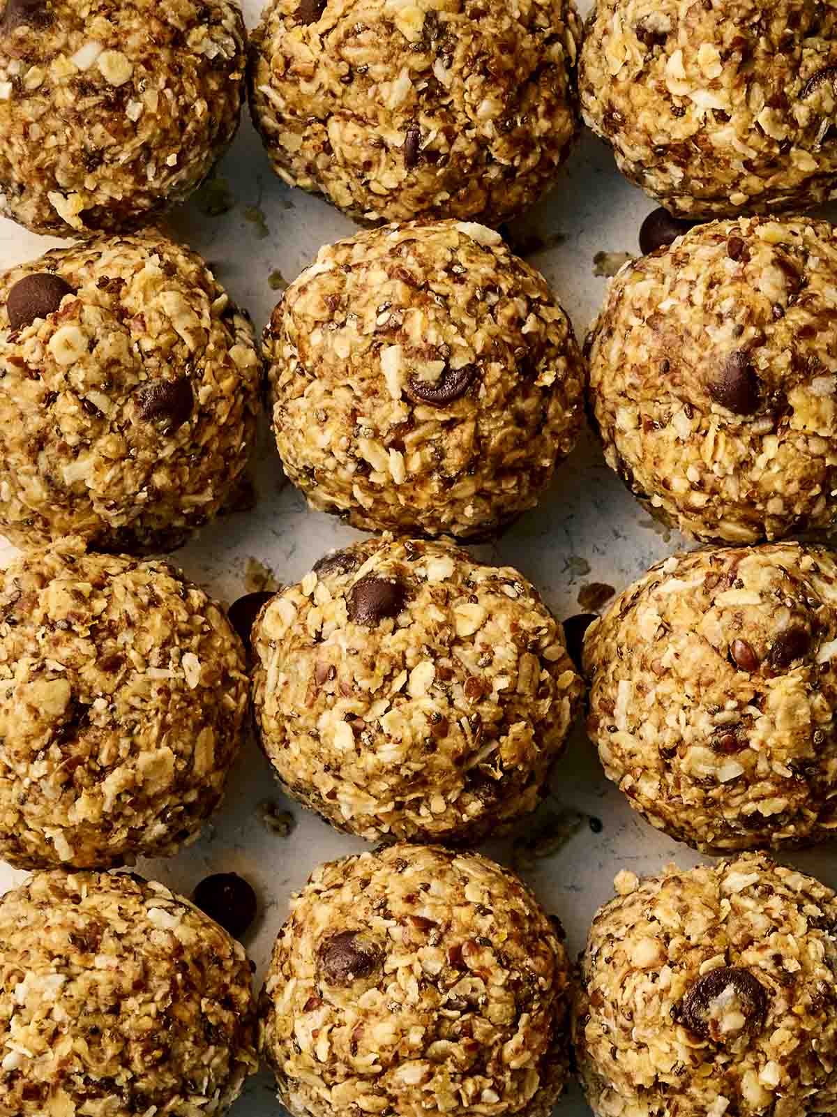 Three rows of rolled up healthy, vegan Energy Bites.