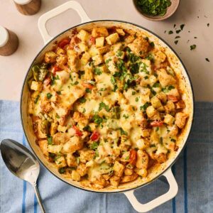 A pan filled with Chicken Fajita with potatoes.