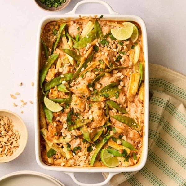 An oven dish filled with Thai Chicken Tray Bake.