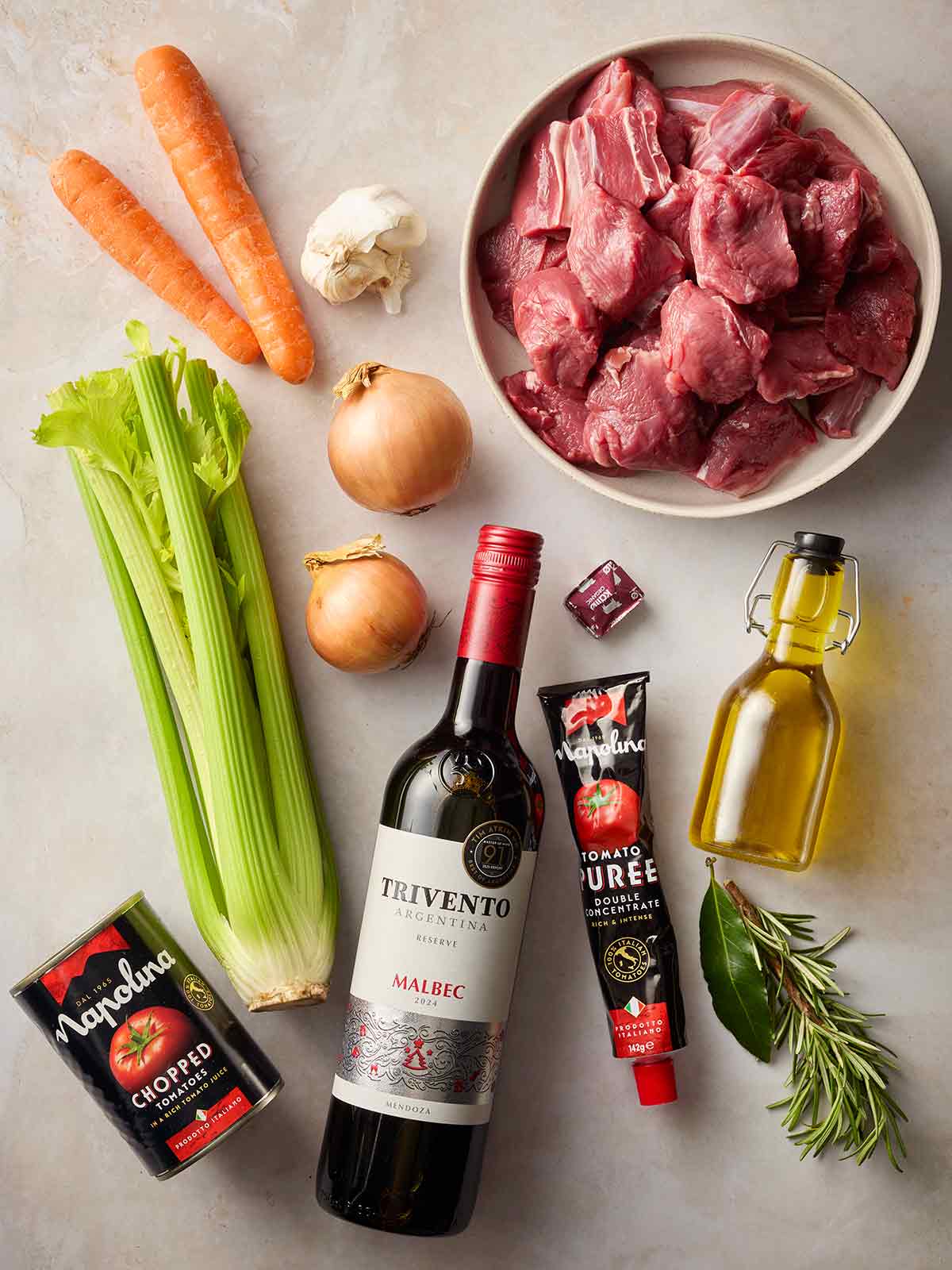 The ingredients for baking Beef Ragu laid out on a counter top.
