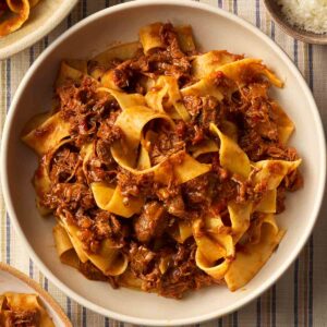 A bowl of Beef Ragu with pasta, ready to eat.