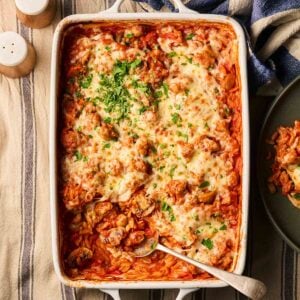 Sausage Orzo Bake on a table, ready to serve.